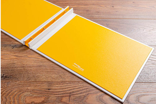 Inner cover of screw post portfolio hand made by Hartnack and Co