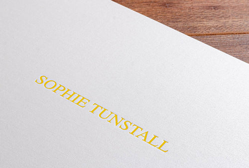 Personalised portfolio cover in yellow foil embossing on white cover