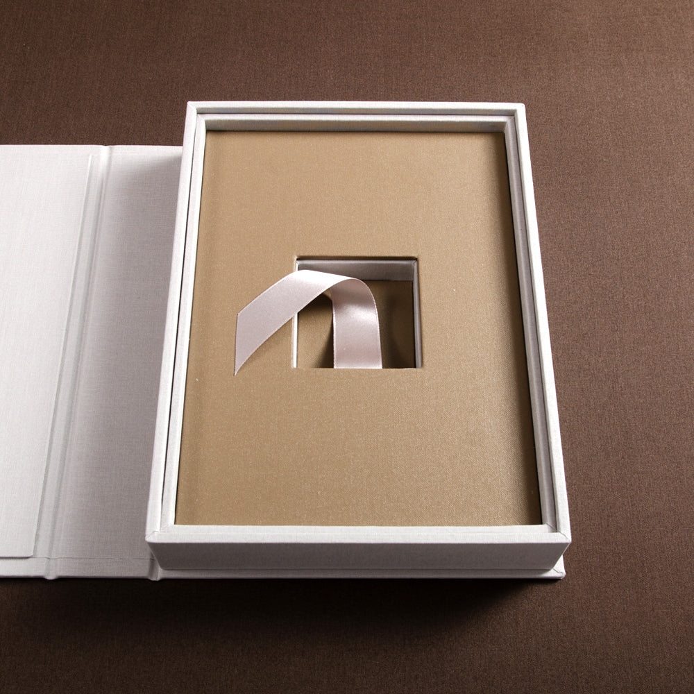 luxury presentation box open with ribbon on brown fabric - Gallery image 3