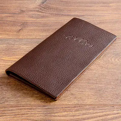 Personalised leather bill presenter with embossed restaurant logo - Hospitality