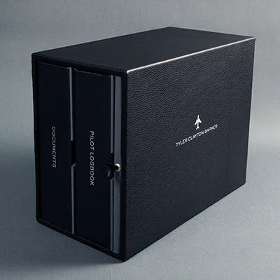 large black leather slipcase with silver embossed personalisation holding pilot logbook and pilot document binders - Pilot Logbooks, Multi Slipcase