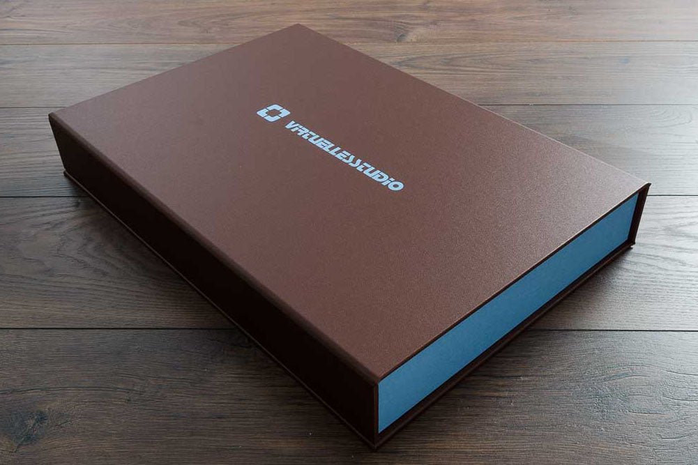 A3 photographers portfolio box. Product A3 drop back clamshell box in Cornerline brown buckram and blue foil personalisation