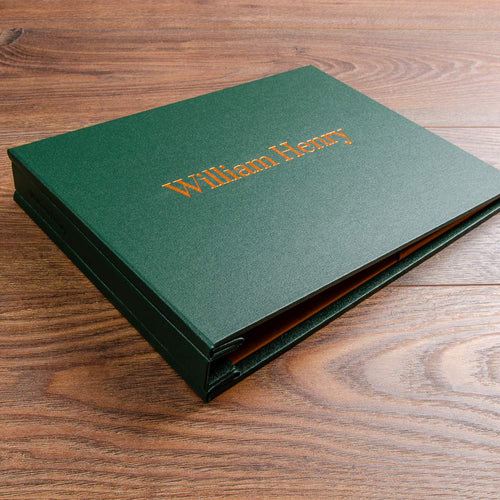 dark green screw post binder with copper foil personalised embossing on the cover