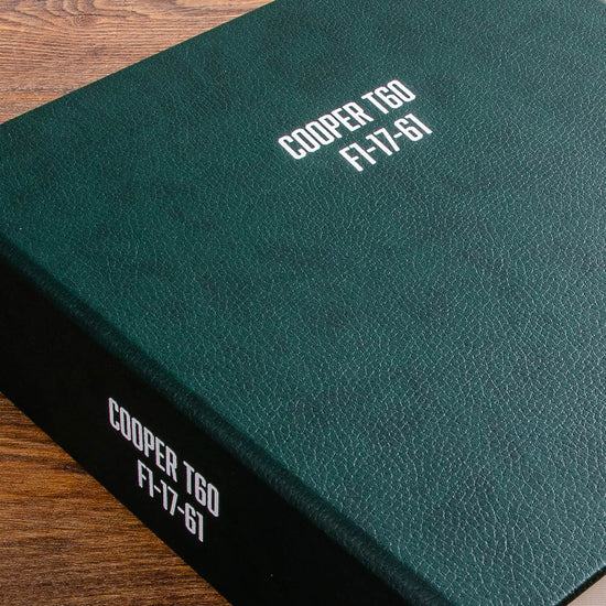 Green cooper racing car history document file with white foil embossed logos