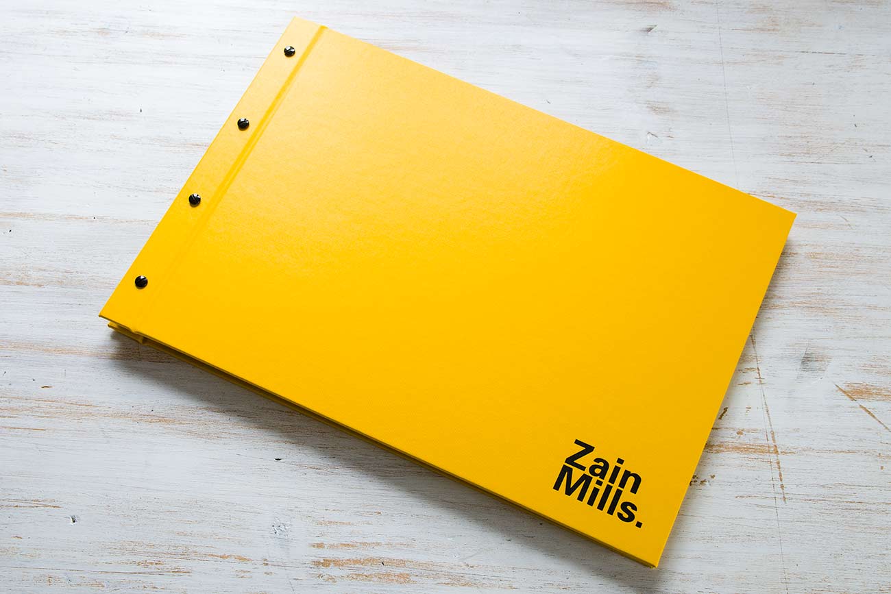 Striking yellow A3 photography portfolio. Product is Exposed screw post binder