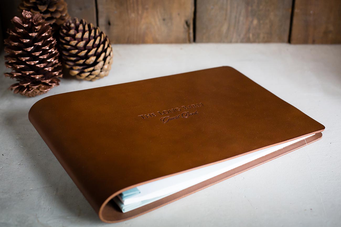 luxury leather wedding guest book with personalised cover
