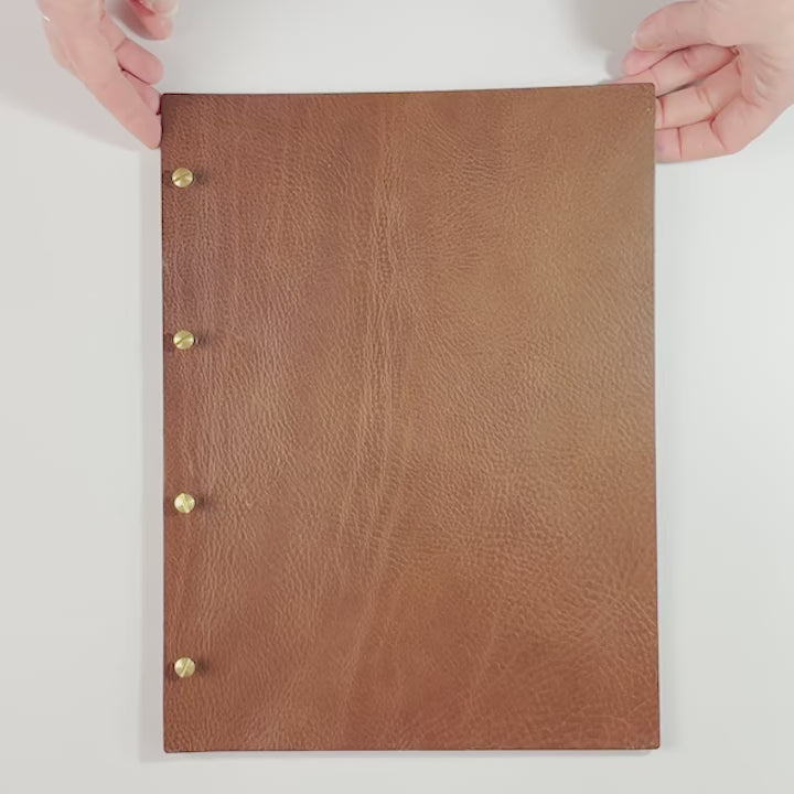 Video of using a Hartnack and Co leather exposed screw post binder