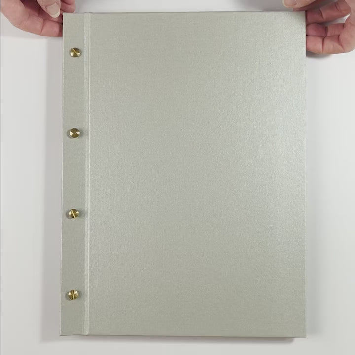 Video showing the use of a Hartnack and Co Exposed Screw Post Binder