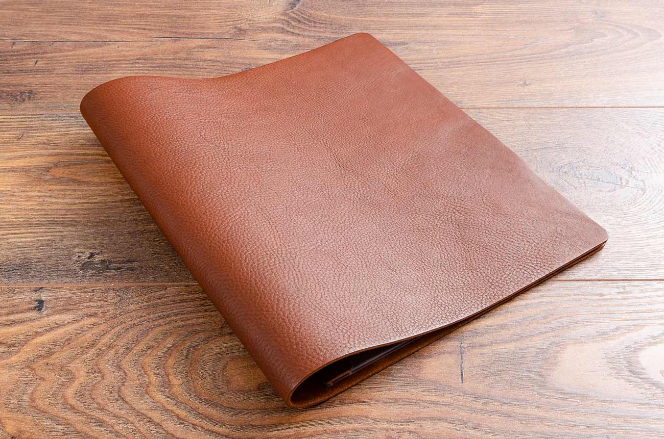 A4 full wrap leather menu cover in medium brown 2.5mm veg tanned leather