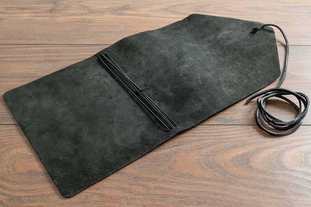 Single Piece Leather Cover with Natural Suede Backing showing Four Elastic Ties