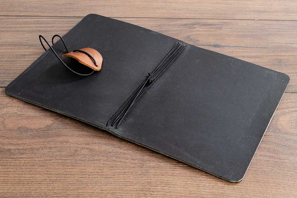 Black Leather A5 Notebook Holder Open Showing 4 Elastic Cords
