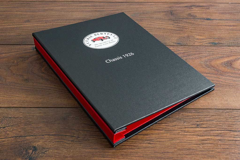 A4 hidden screw post vehicle document binder in charcoal buckram with full colour personalisation on the cover. 