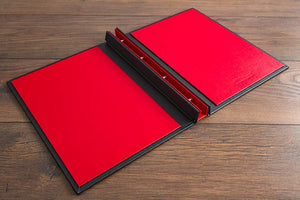 The inside cover of vehicle document binder is in Ruby red buckram