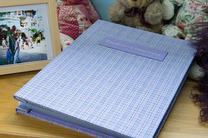 Childs scrapbook and memory keeper in specially supplied dress material for the cover and personalised name plaque