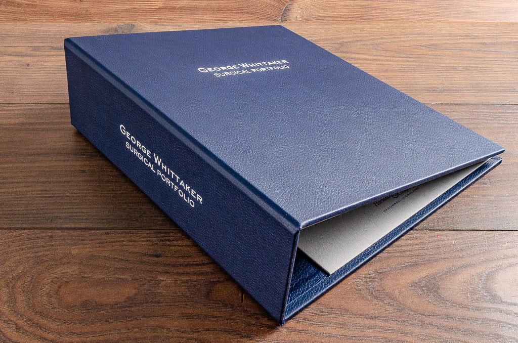 Luxury high quality bespoke medical surgical portfolio in blue faux leather with personalisation on the cover and spine 