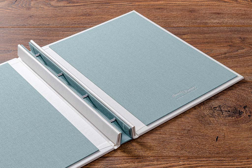 Hidden screw post presentation portfolio book in Pearl buckram with personalised front cover