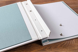 Taking the cover off the portfolio is quite straight forward, firstly lift over the cover and unscrew the screw post caps.
