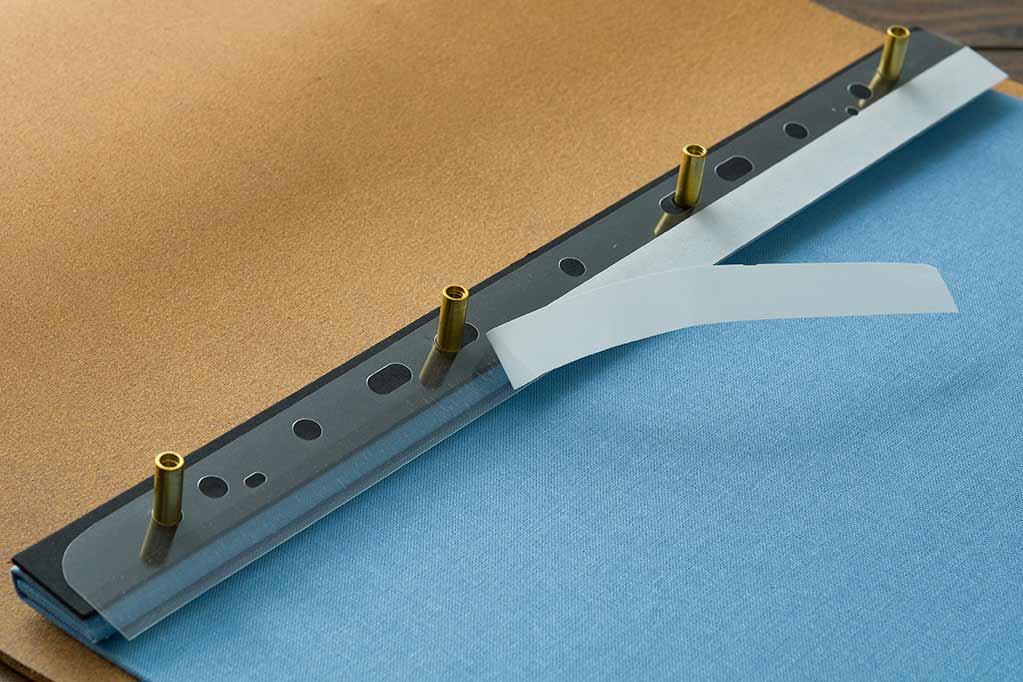 adhesive hinge strips for placing prints and paper into portfolios