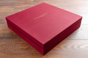 Square box with fitted lid in red book cloth and gold foil personalisation