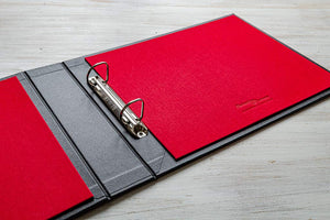 The inner cover of the visitors book is in alton red book cloth and has a 2 ring binder mechanism